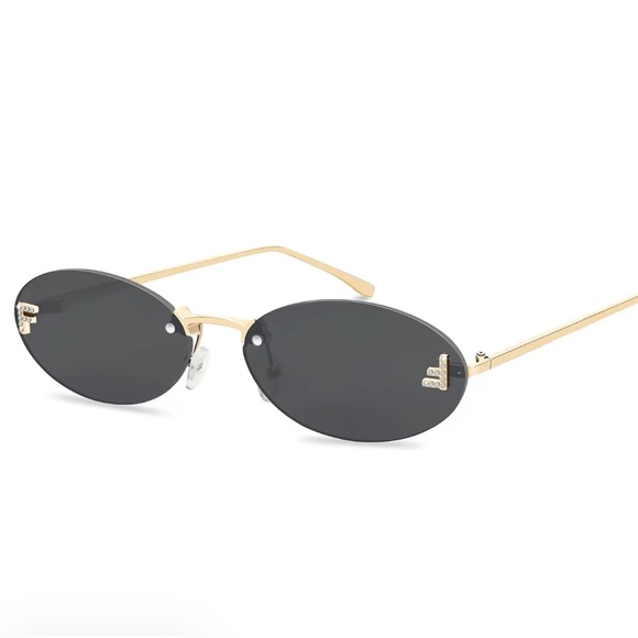 Fendi Accessories - oval framed sunglasses Black+gold